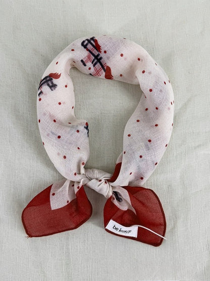 Scarvii Sheer Pony Dot Square Scarf folded showing black and white polka dot pattern