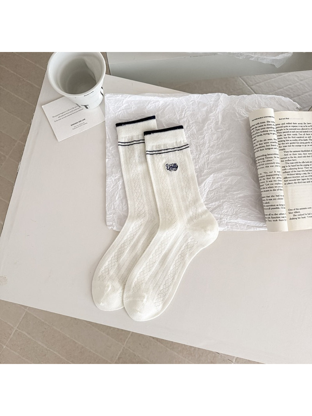 Rufia vintage stripe crew socks displayed on mannequin foot