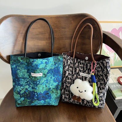 Cosbai Mixed Print Everyday Carryall Handbag front view with floral and geometric patterns