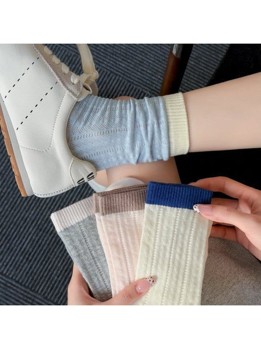 Close-up of ribbed texture on Rufia colourblock socks showing fabric detail