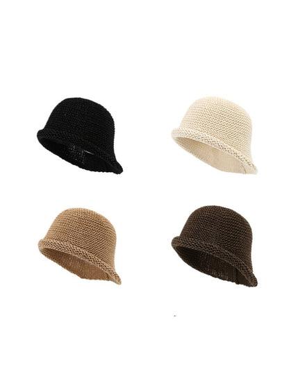 Haila soft texture bucket hat in beige displayed on a white background