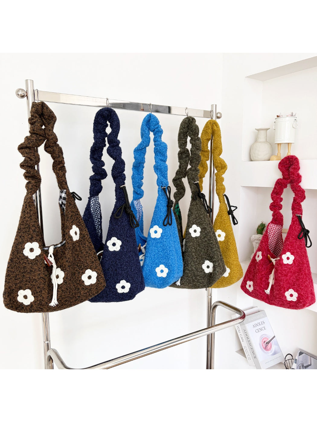 Close-up of floral knit pattern and drawstring closure on Cosbai shoulder bag