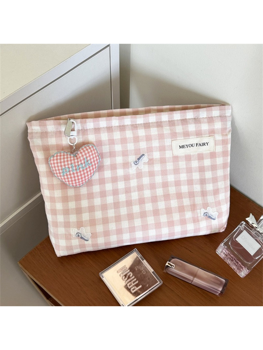 Cosbai makeup pouch open showing spacious interior with pink lining