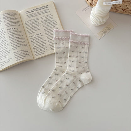 Rufia soft ruffle trim knit crew socks styled with casual outfit on model