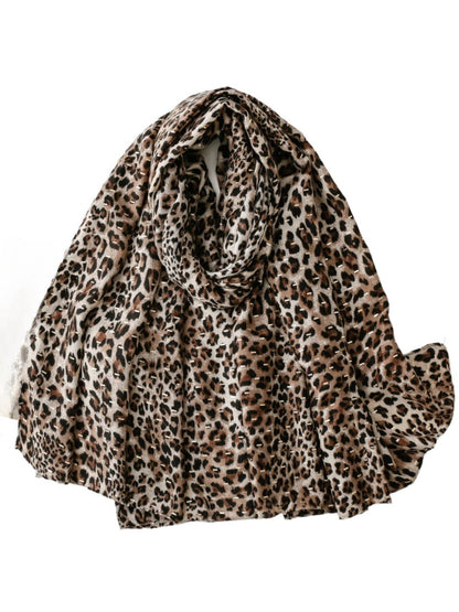 Scarvii lightweight scarf with leopard print draped on a white background