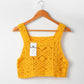 Close-up of crochet pattern on Crosa vintage camisole tank top