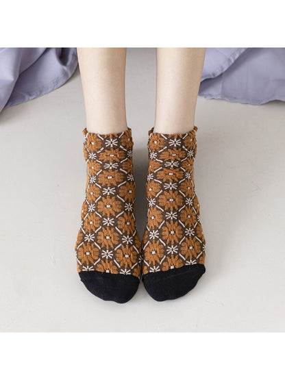 Rufia soft knit flower ankle socks displayed on a wooden surface