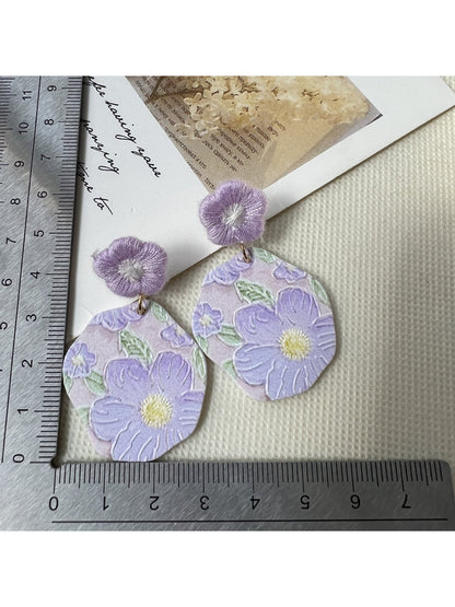 Earwish Purple Bloom Drop Earrings worn on a model showcasing size and style