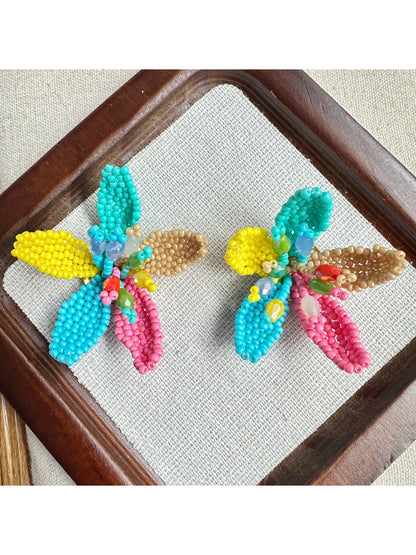 Model wearing Earwish Colourful Bead Bloom Earrings showcasing size and colorful beads