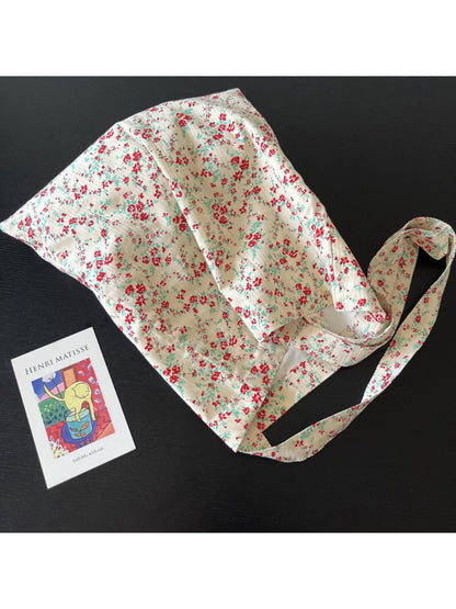 Cosbai tote bag worn over shoulder demonstrating size and fit
