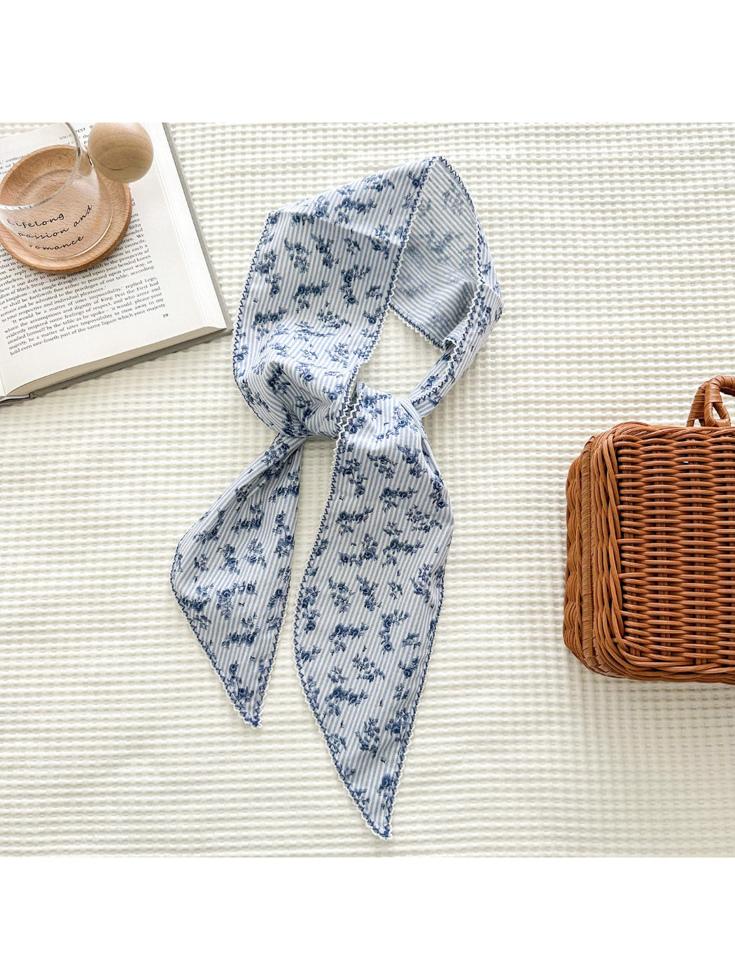 Side view of floral stripe lace skinny scarf highlighting delicate lace edges