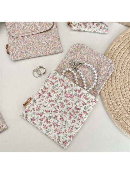 Cosbai Floral Print Coin Pouch held in hand showing size and floral design