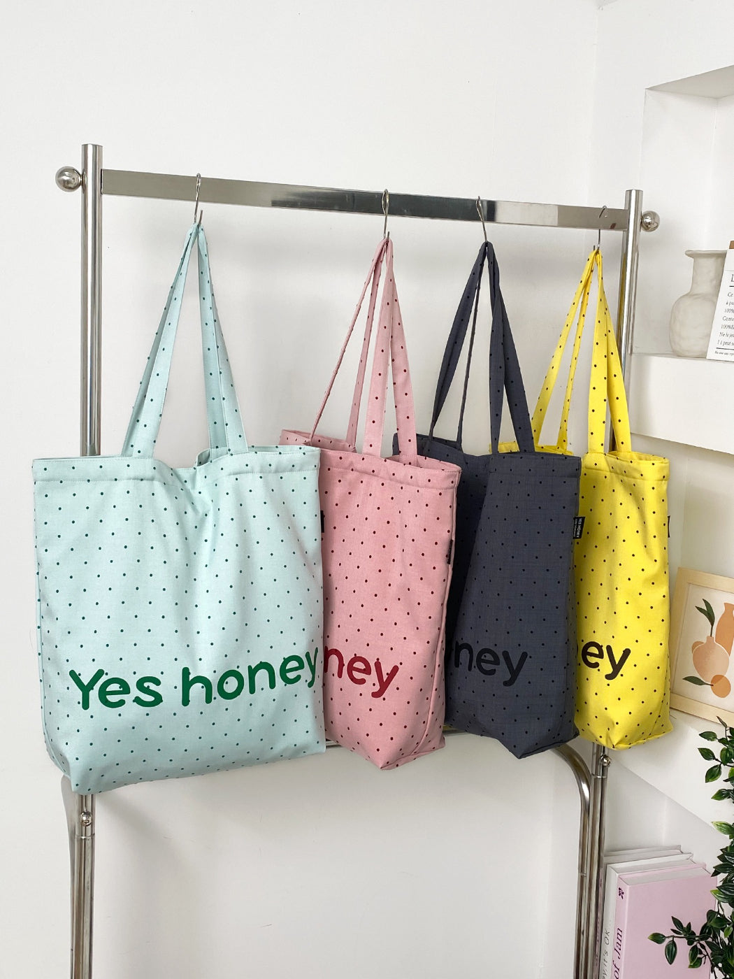 Cosbai Dot Print Graphic Tote Bag folded flat to display fabric texture and print