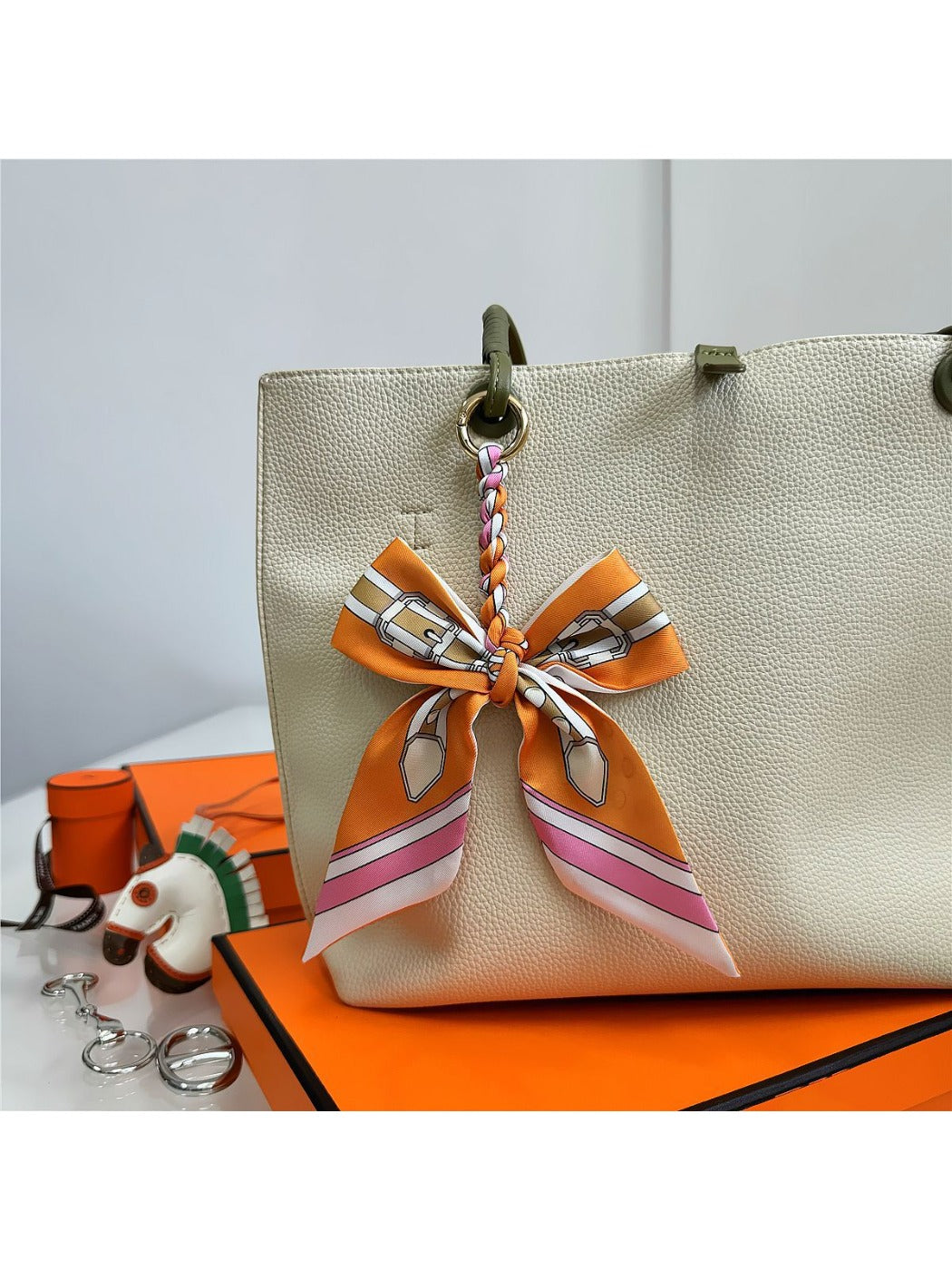 Koco Elegant Bow Bag Charm with bow detail and ribbon detail