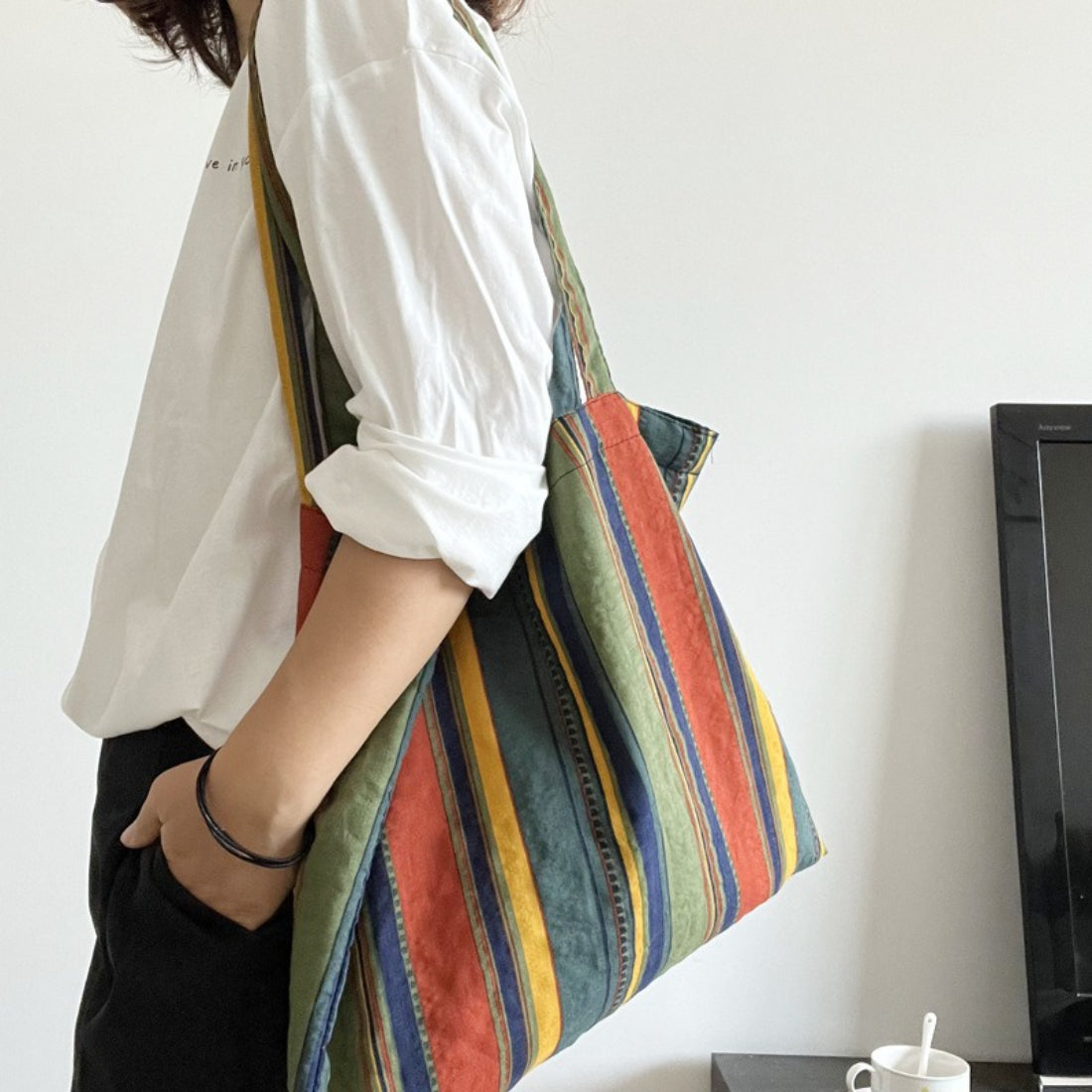 Side view of Cosbai Boho Stripe Carryall Tote Bag showing spacious interior