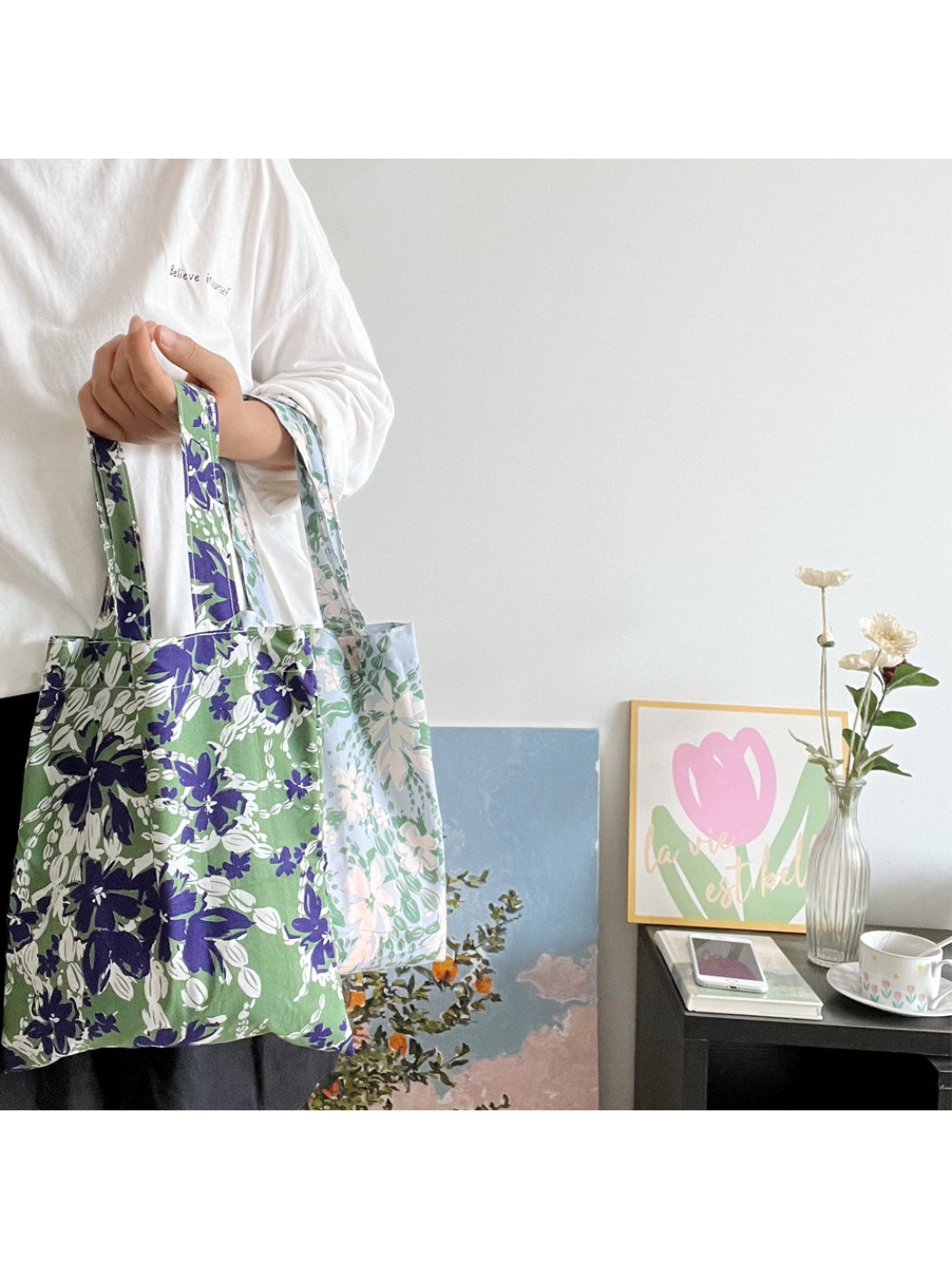 Cosbai Soft Botanical Shopper Bag held by model wearing casual outfit