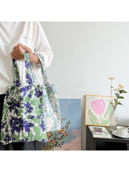 Cosbai Soft Botanical Shopper Bag held by model wearing casual outfit