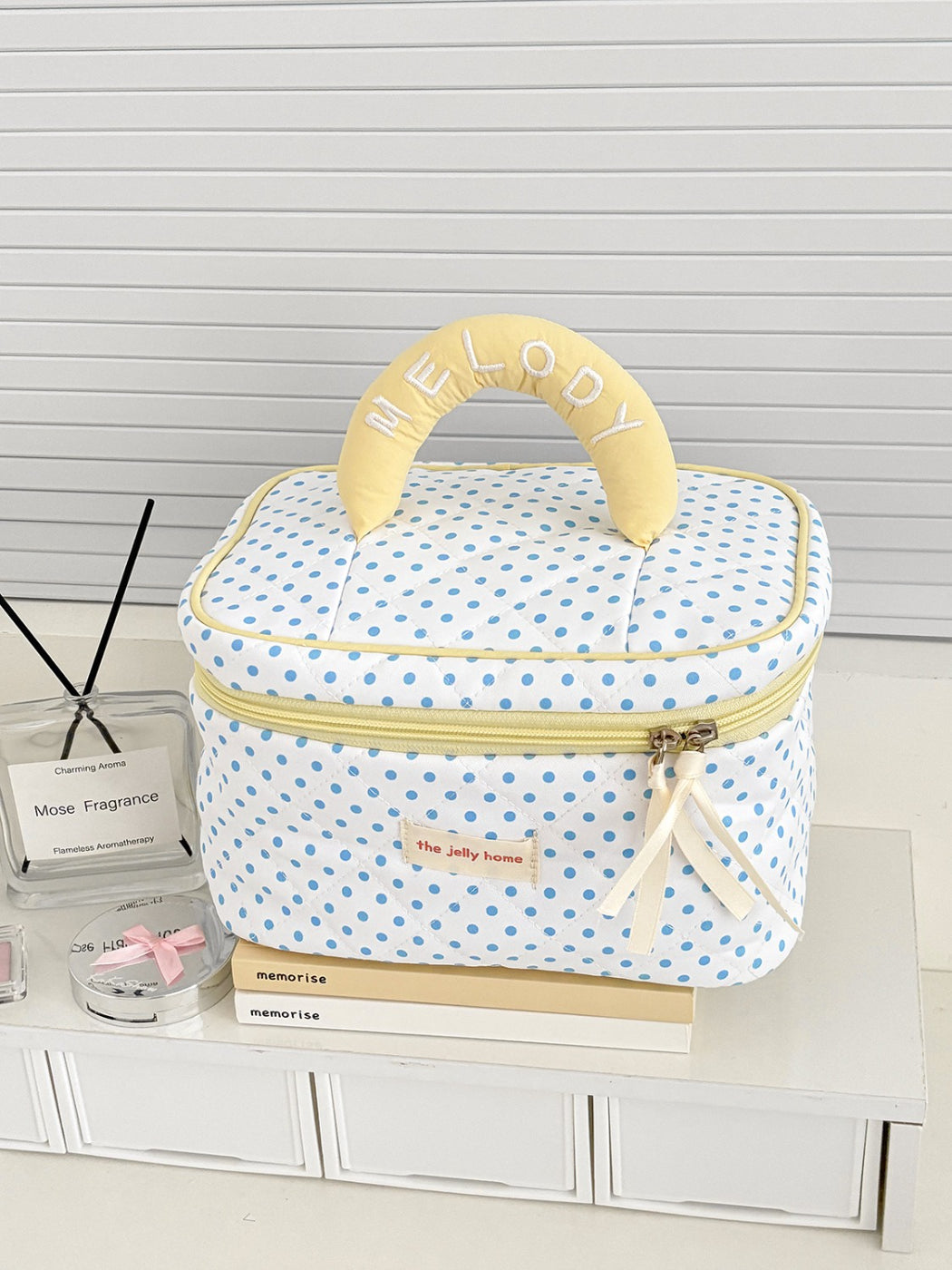 Cosbai polka dot quilted cosmetic case on white background