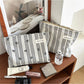 Cosbai gingham bow makeup pouch in black and white check pattern