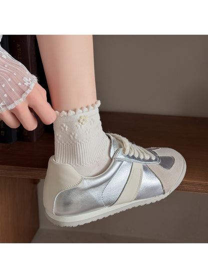 Model wearing Rufia Sweet Floral Knit Crew Socks with casual shoes