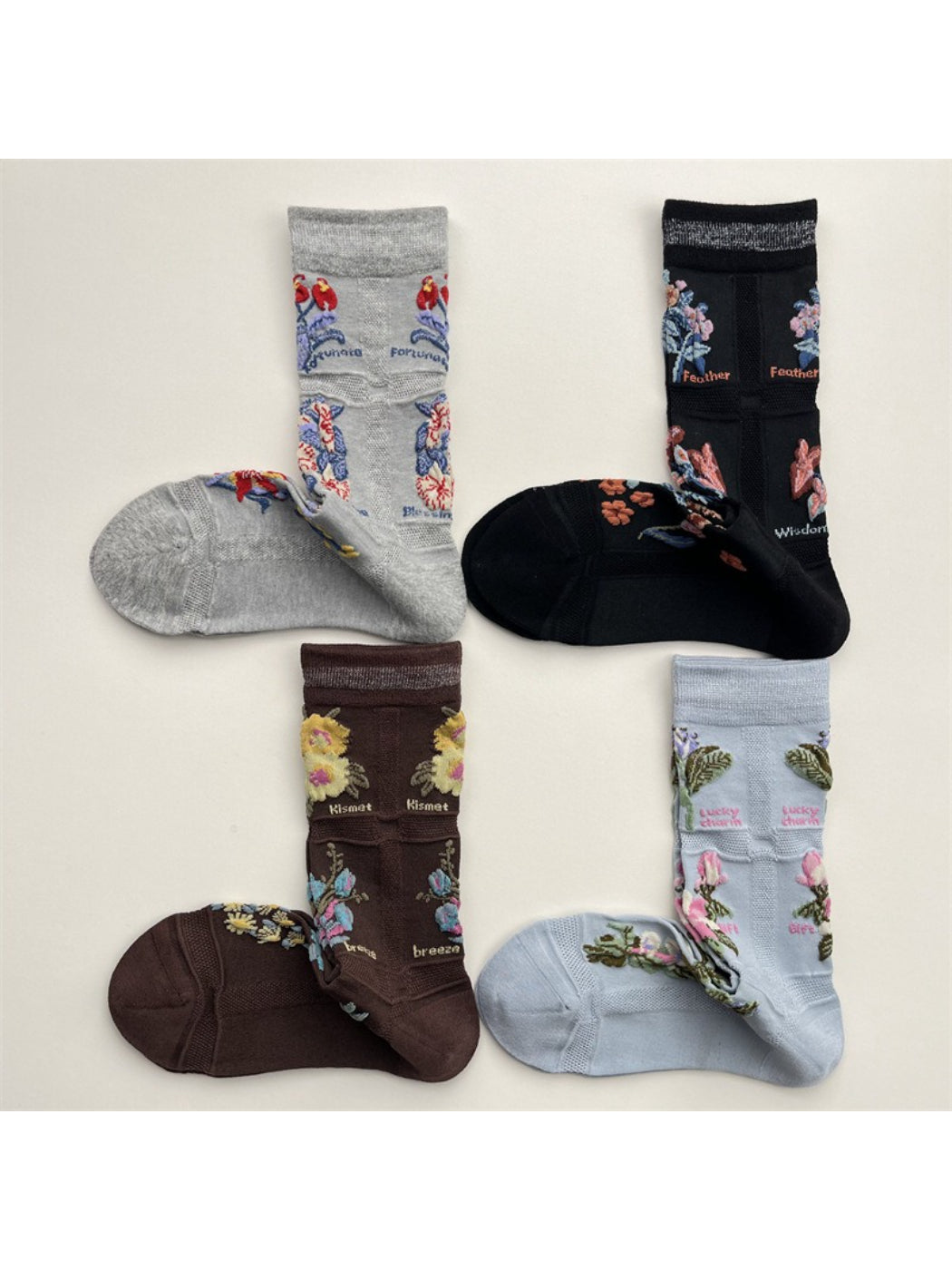 Rufia mesh floral mid-calf socks displayed flat showing floral pattern
