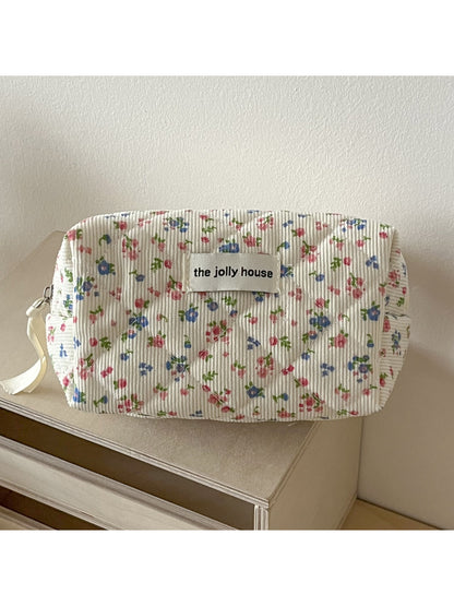 Cosbai floral toiletry bag open, displaying spacious interior with fabric lining