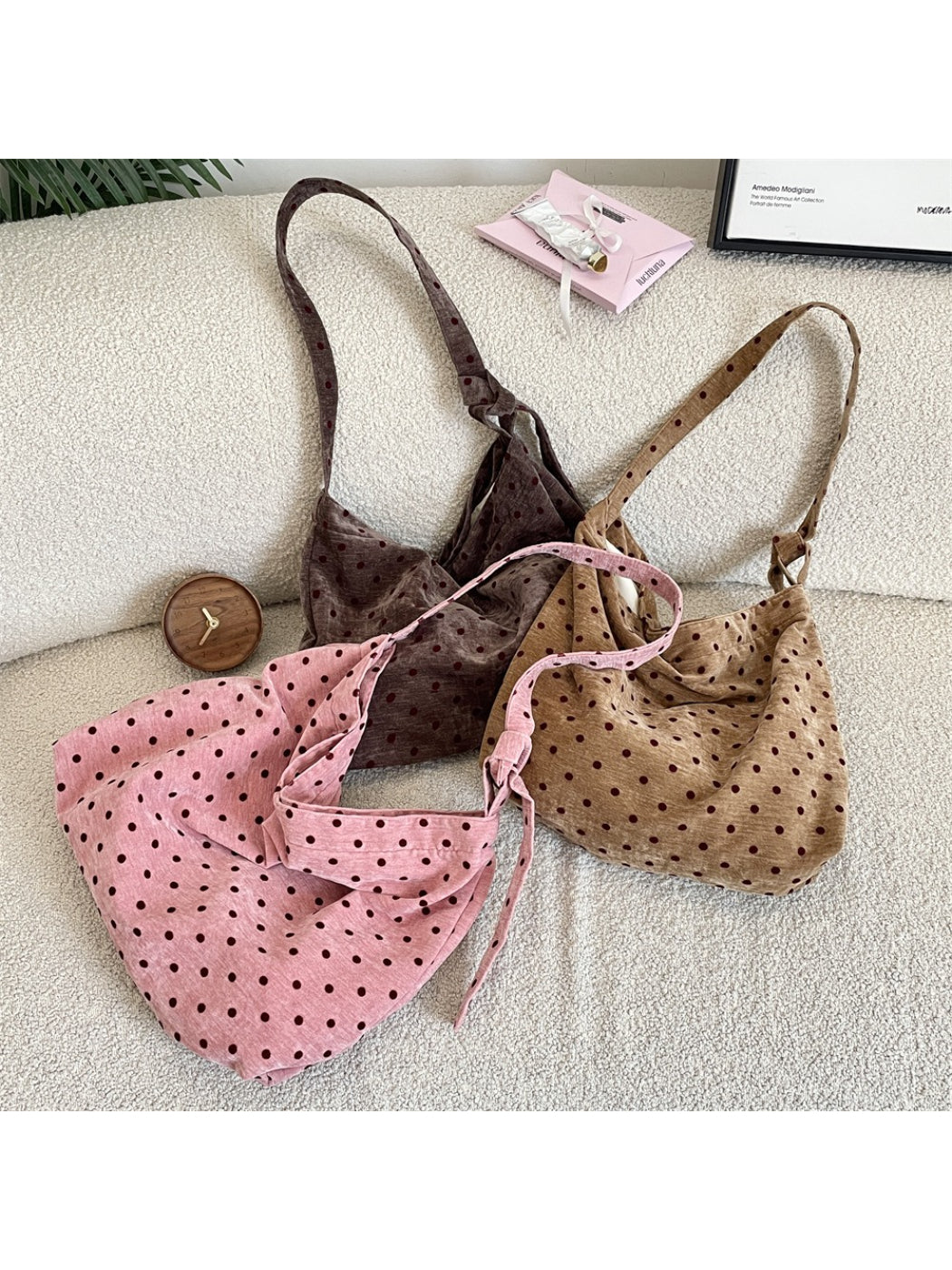 Cosbai Polka Dot Crossbody Slouchy Bag front view with black and white polka dot pattern