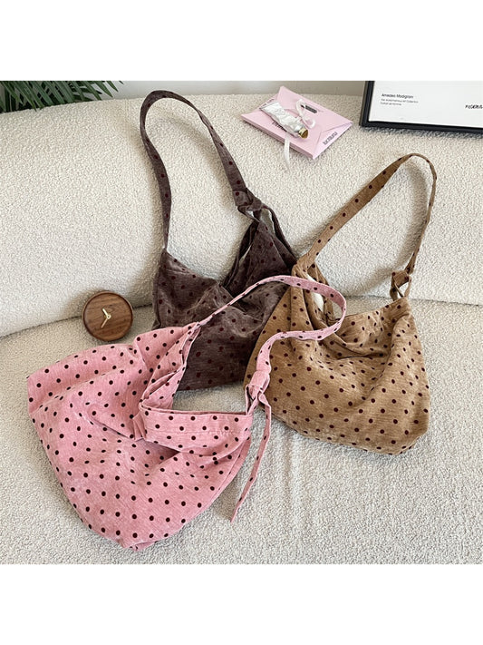 Cosbai Polka Dot Crossbody Slouchy Bag front view with black and white polka dot pattern