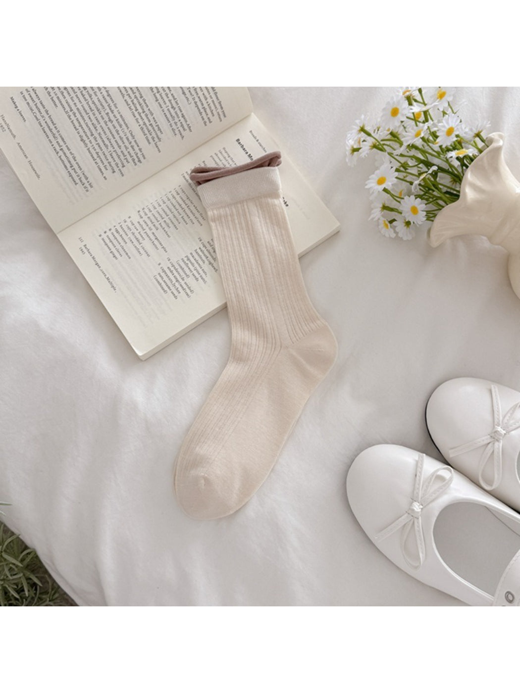 Top view of Rufia solid rib texture socks showing cuff detail