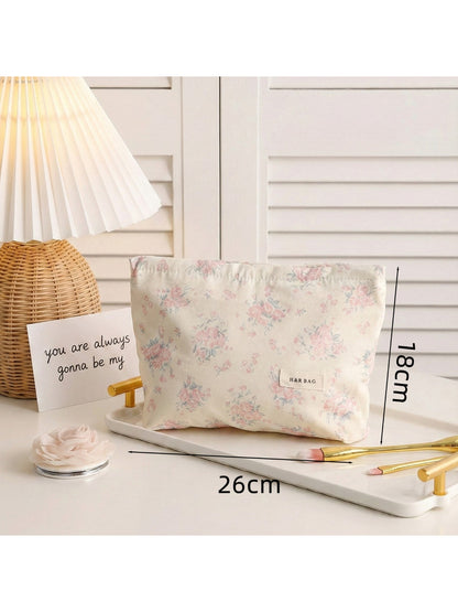 Cosbai floral makeup bag photographed from side angle highlighting shape and print
