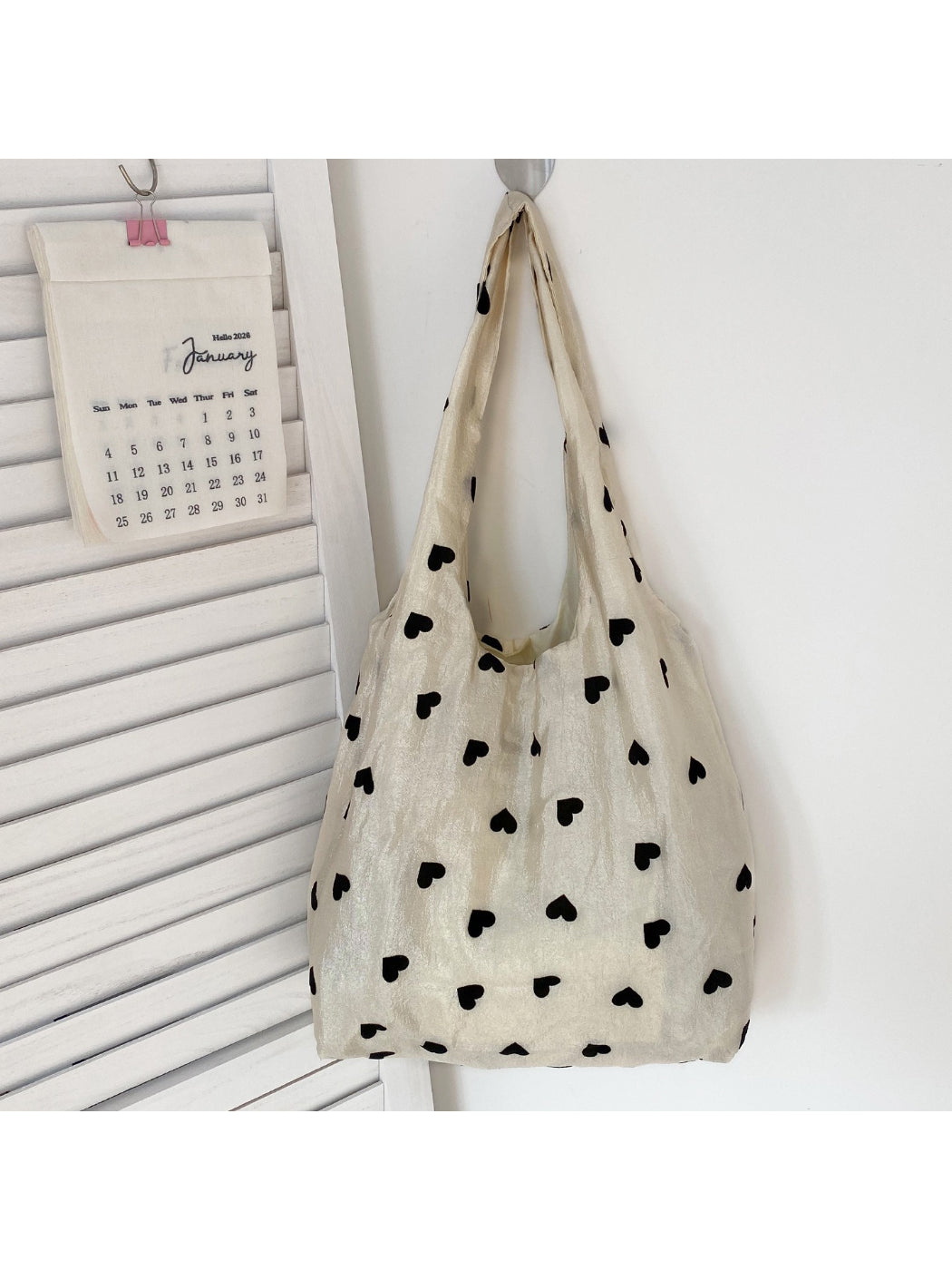 Side view of Cosbai Everyday Heart Print Tote showing handles and stitching