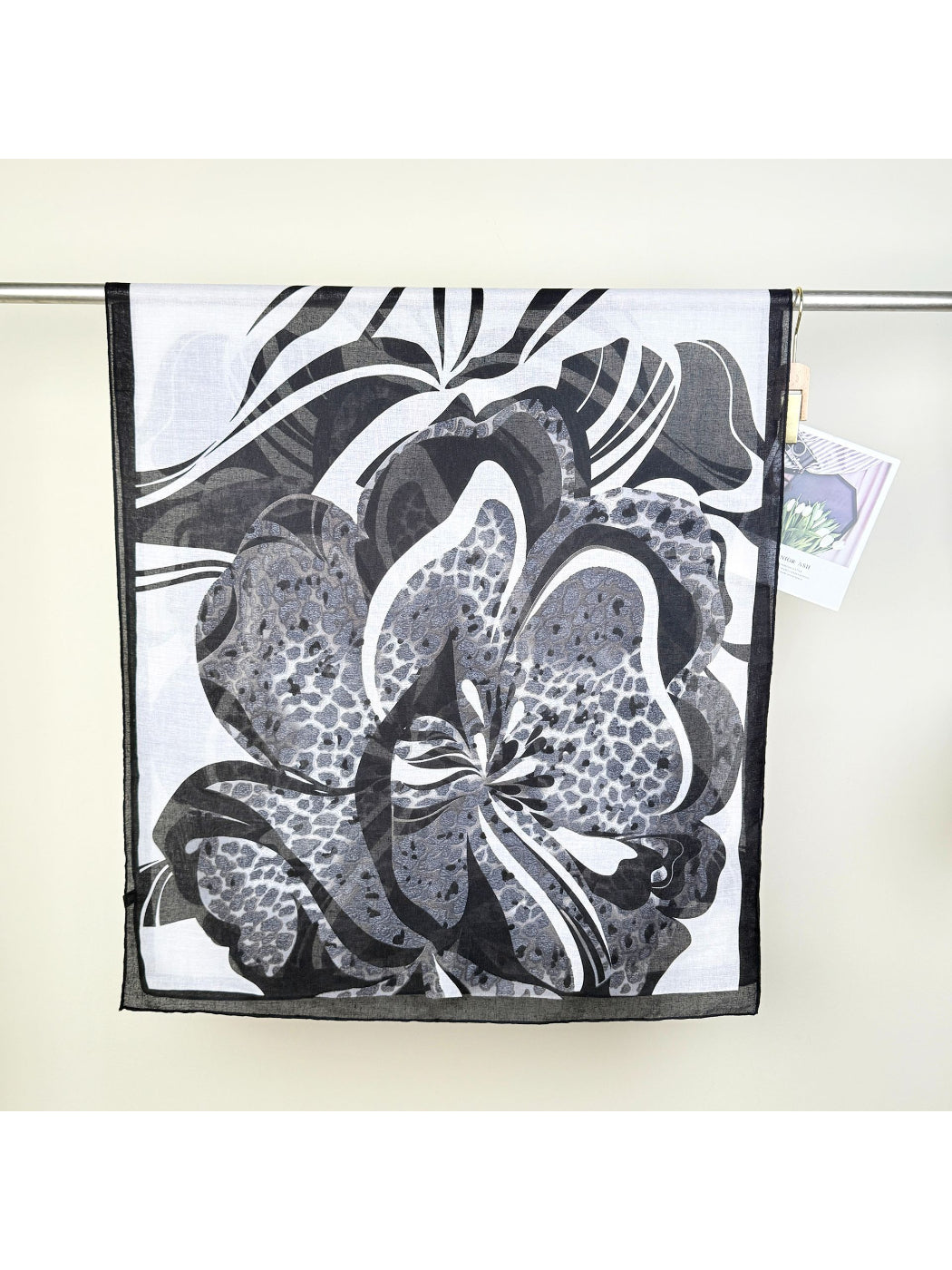 Scarvii Leopard Flower Square Scarf tied on a handbag handle