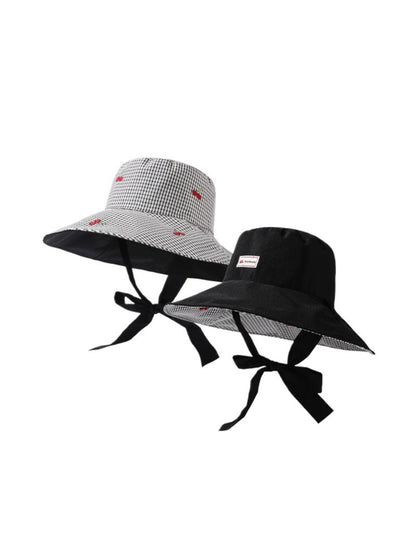 Haila reversible gingham brim hat in black and white check pattern, front view