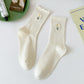 Rufia - Floral Embroidered Ruffled Mid-Calf Socks