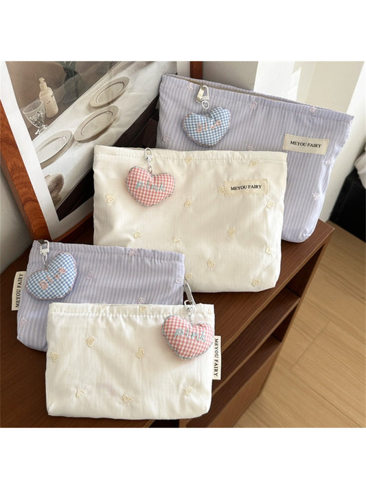 Cosbai soft cosmetic bag with pink heart pattern on light background