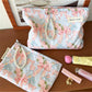 Close-up of Cosbai Bow Floral Cosmetic Bag showing floral print details