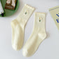 Rufia - Floral Embroidered Ruffled Mid-Calf Socks
