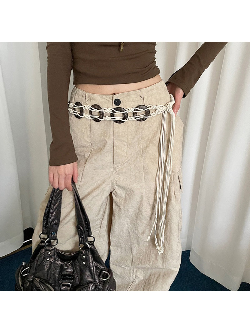 Side view of Beco Boho woven ring tie waist belt showing braided texture