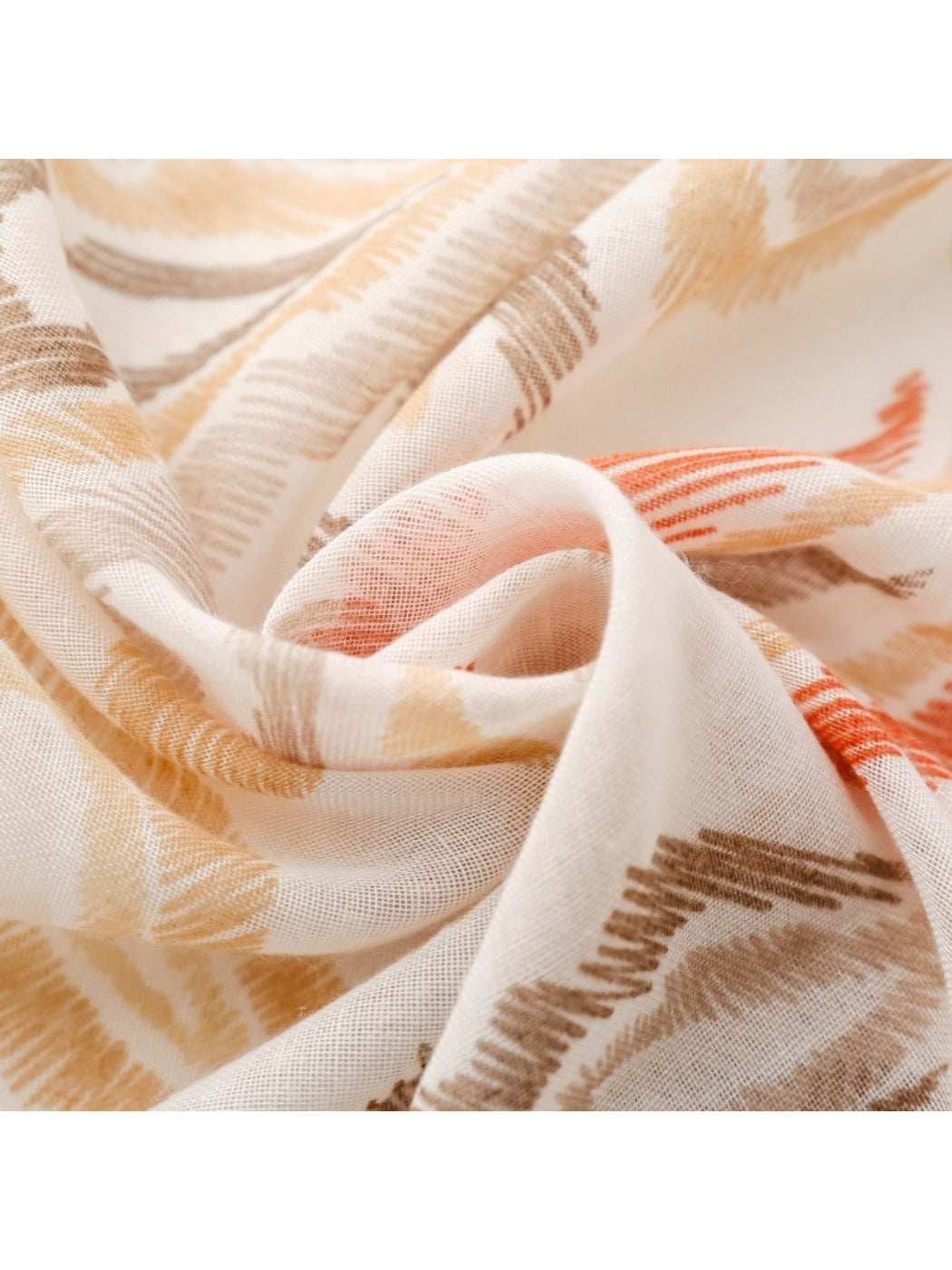 Scarvii scarf draped over shoulder highlighting soft fabric and paisley print