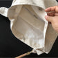 Interior view of ivory hobo bag with spacious and lining