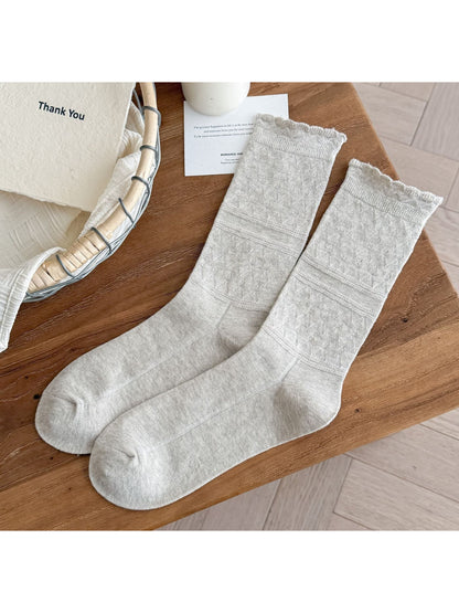 Rufia soft scallop knit socks in pastel pink color laid flat