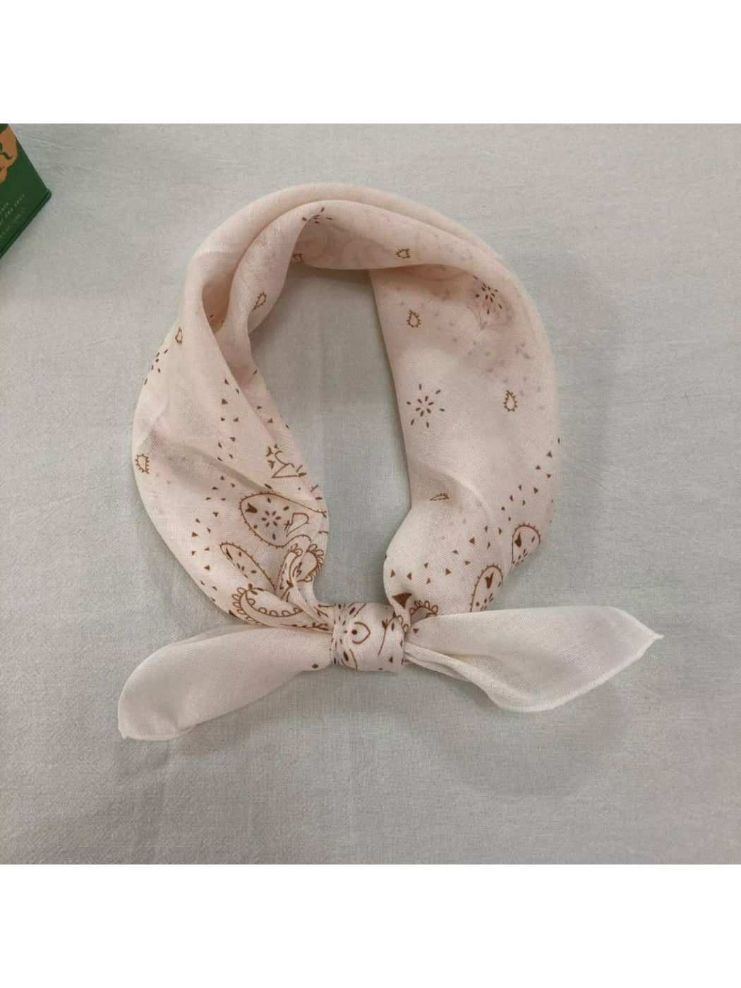 Scarvii Baroque Floral Square Scarf shown in a close-up of the corner with detailed baroque floral print