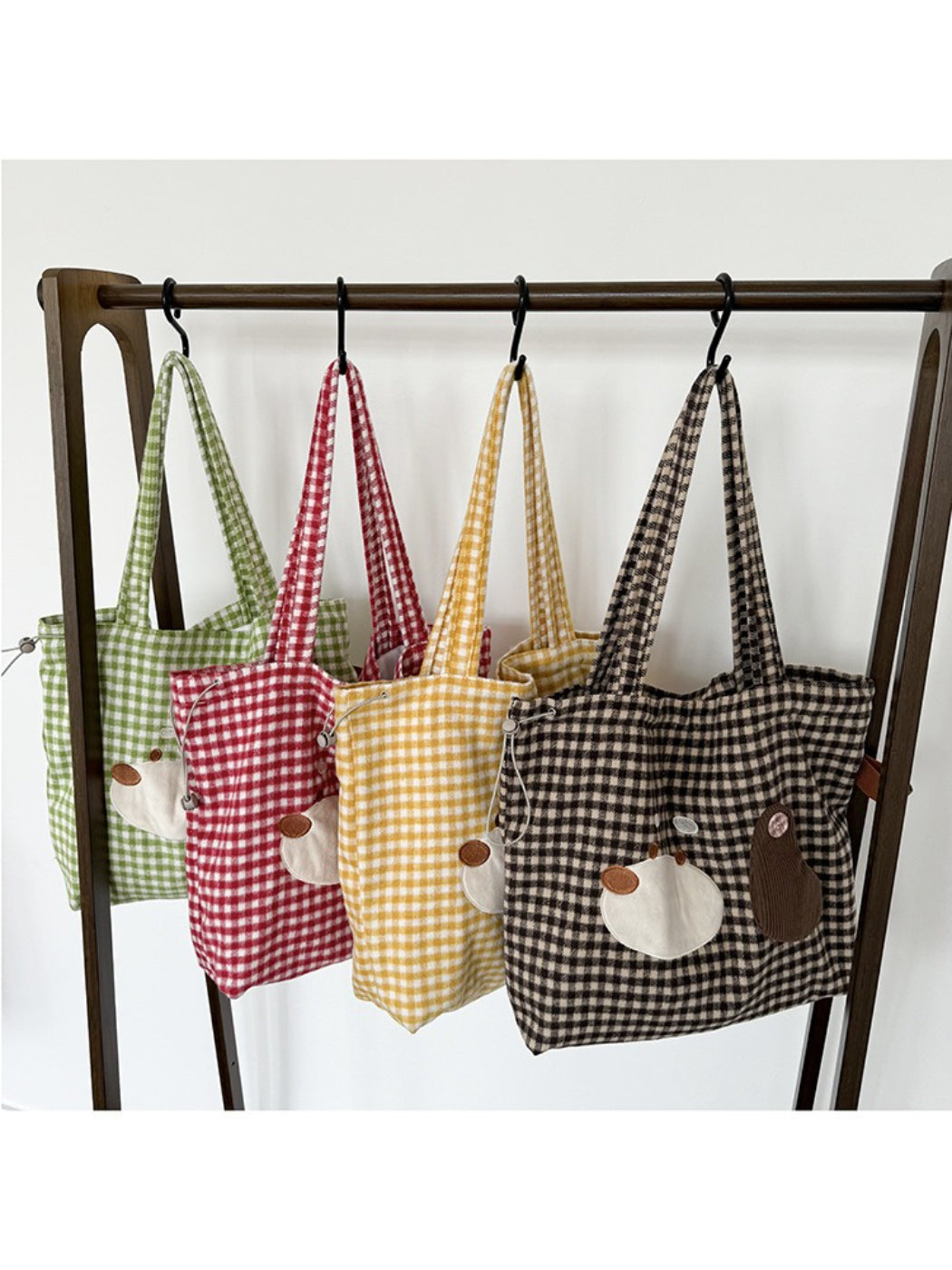 Cosbai Puppy Gingham Drawstring Tote styled with casual outfit outdoors