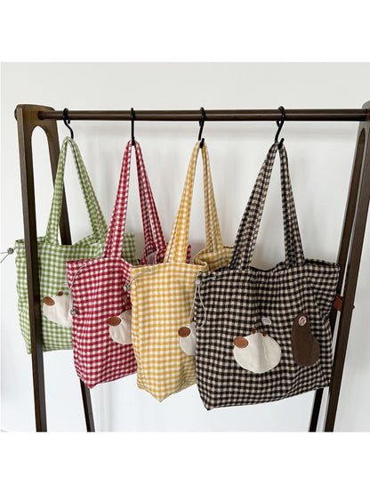 Cosbai Puppy Gingham Drawstring Tote styled with casual outfit outdoors