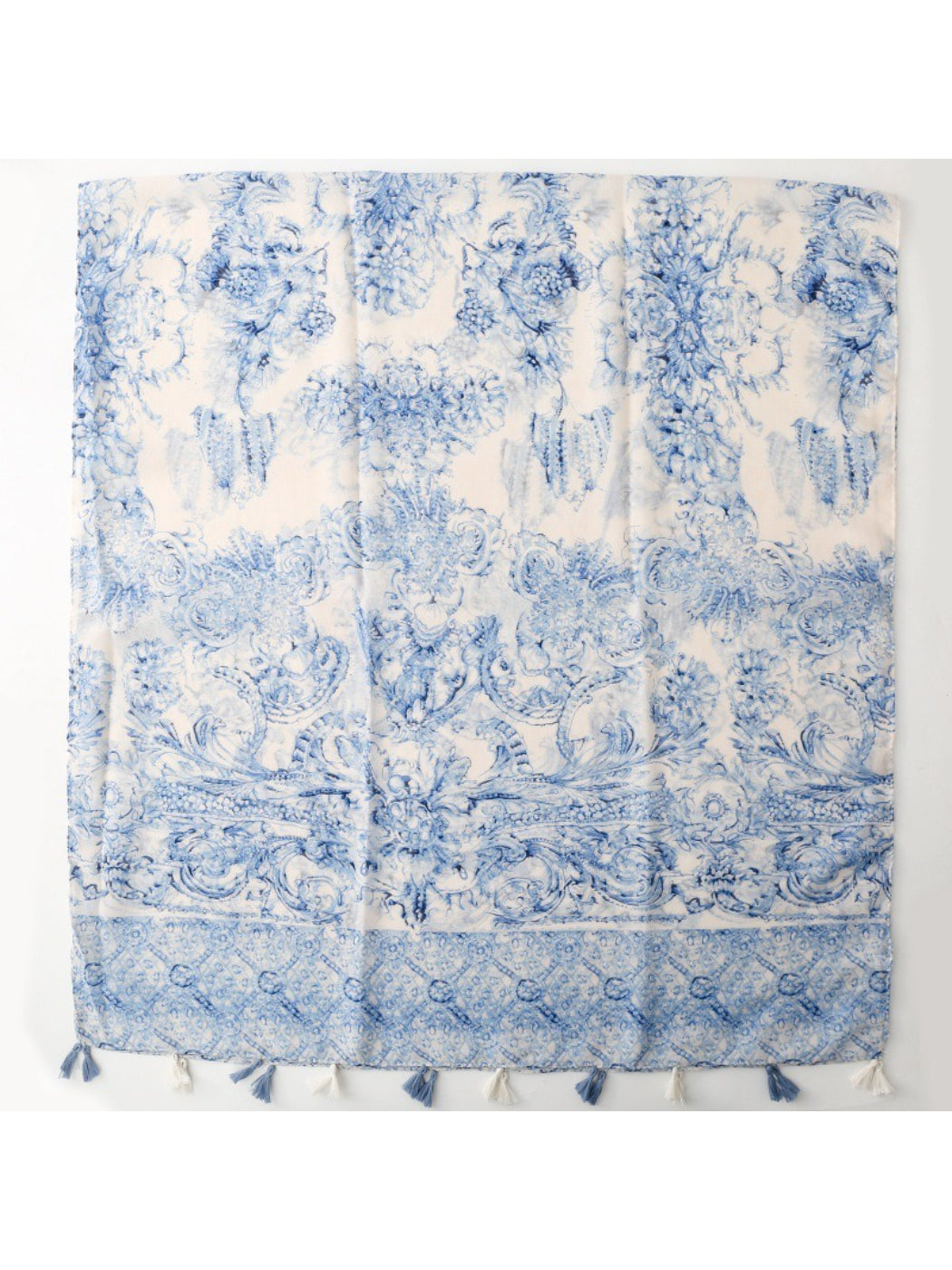 Blue baroque scarf draped over shoulder showing tassels