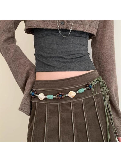 Beco Boho beaded rope tie belt with multicolored beads and braided rope design