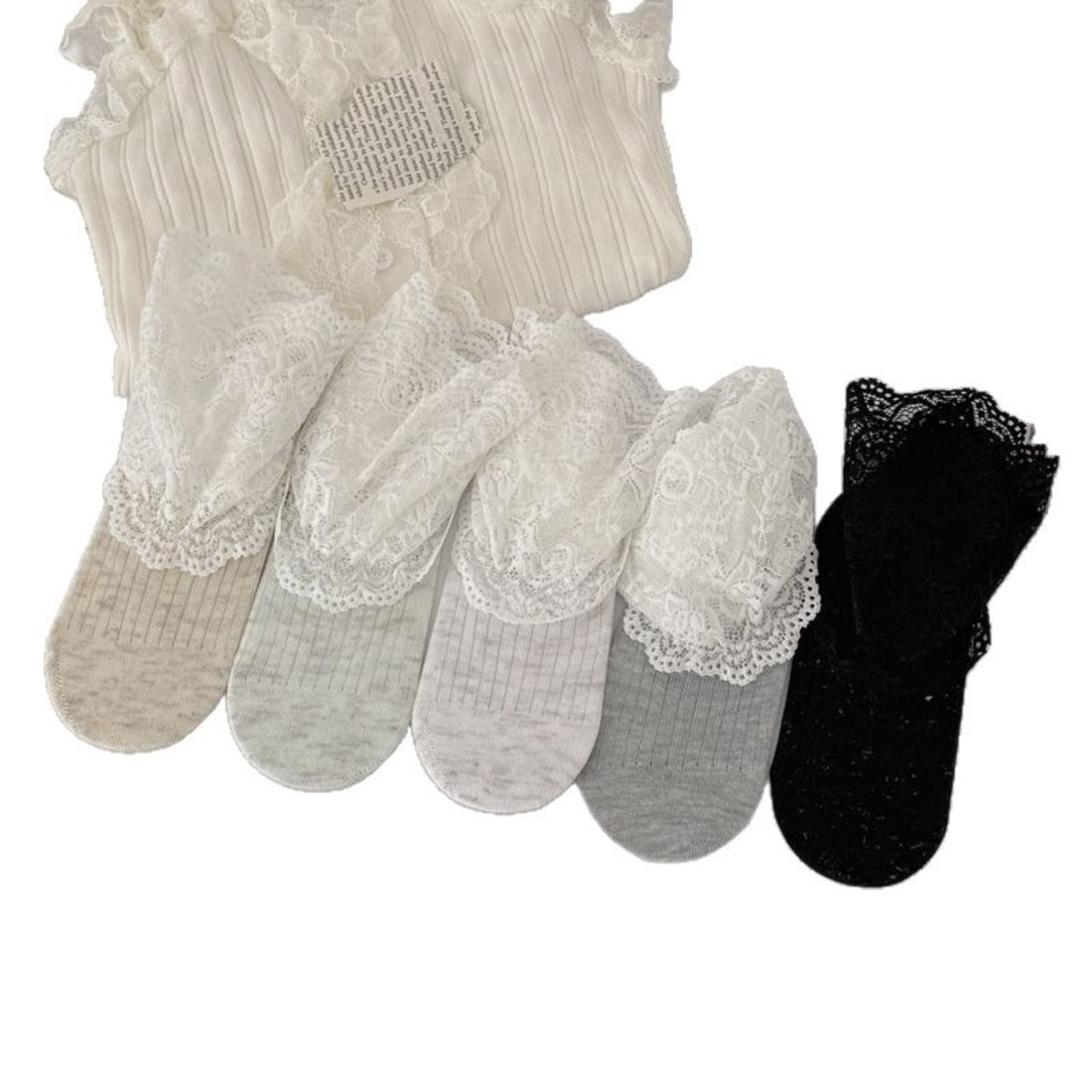 Model wearing Rufia lace trim crew socks styled with casual shoes and skirt