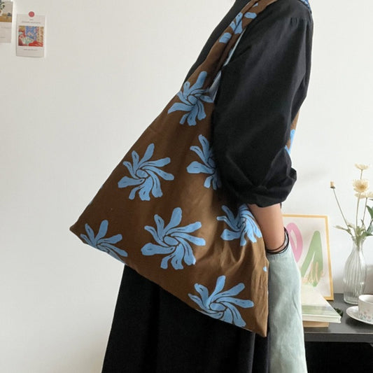 Bold floral everyday tote bag in lightweight polyester fabric