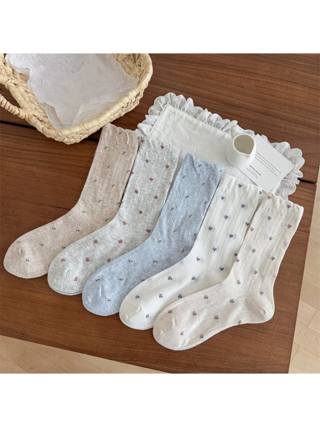 Close-up of Rufia crew socks showing small floral pattern on soft fabric