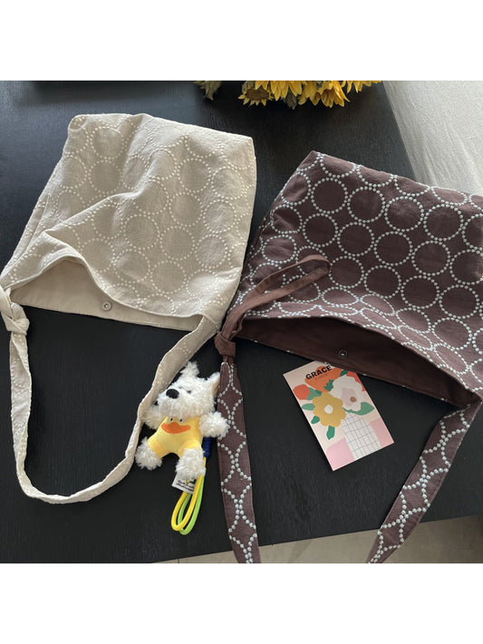 Cosbai Circle Print Tie Shoulder Bag front view with circular pattern and adjustable tie strap
